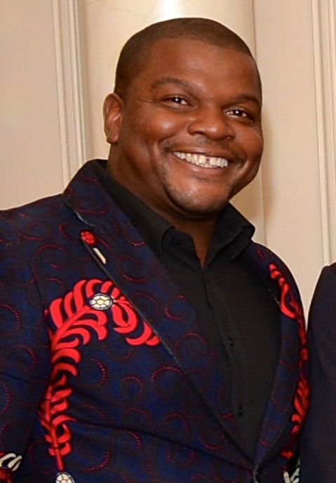 Kehinde Wiley, a 2015 recipient of the U.S. Department of State-Medal of Arts, before a ceremony at the U.S. Department of State in Washington, D.C., on January 21, 2015. [State Department photo/ Public Domain]
