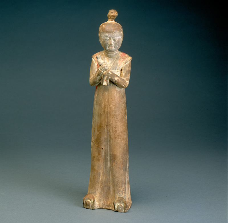 Unknown, Female figure holding a bird (Figura femenina sosteniendo un ave), Six Dynasties period. Gray pottery with pigment traces. Museum purchase with funds provided by Cheryl Fine.