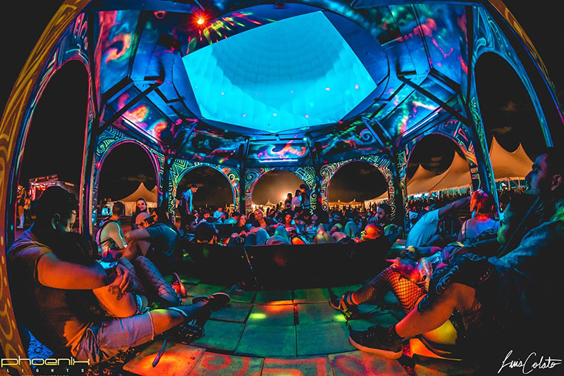 Michelle Meyer, Octagon Lounge—Phoenix Lights Music Festival 2019. Plywood, UV light, and inflatable dome. Photo by Luis Colato.