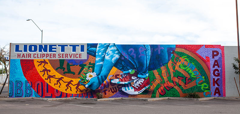 Edgar 8ahau Fernandez and Jeff Slim, Cultivating Unity, 2019. Mural, spray paint and acrylic on wall. Photo: Hector Reyes.
