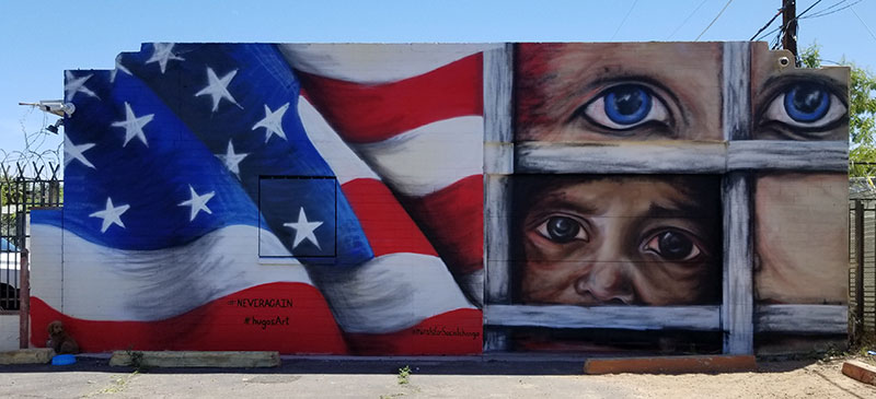 Hugo Medina, Never Again Mural, 2021. Exterior latex and aerosol on wall. [5831 N. 46th Pl., Phoenix, AZ 85018]