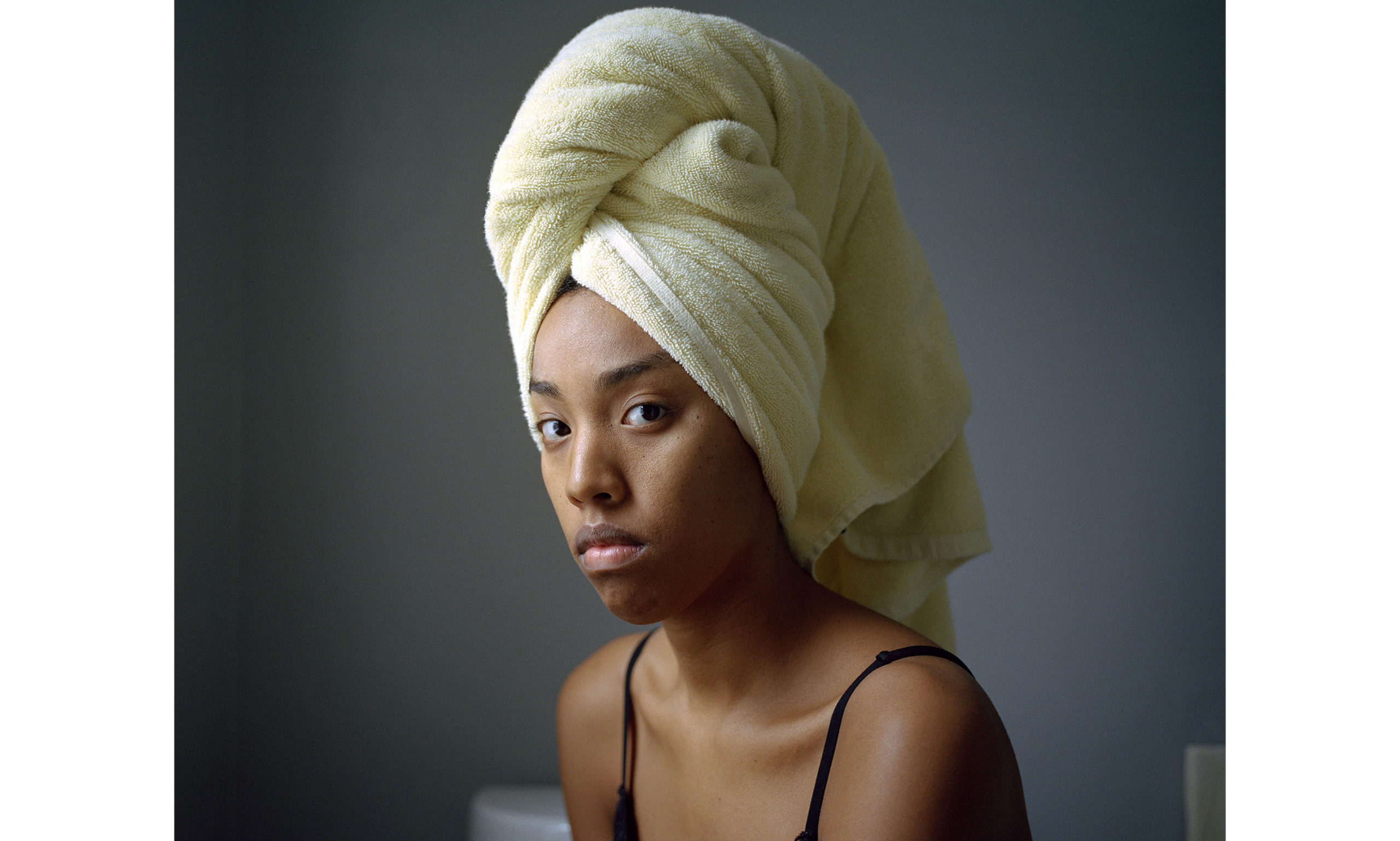 Nadiya Nacorda, Wearing a doek in Lolo and Lola's bathroom, 2018. Inkjet print. Collection of the artist. © Nadiya Nacorda, from All the Orchids are Fine series.