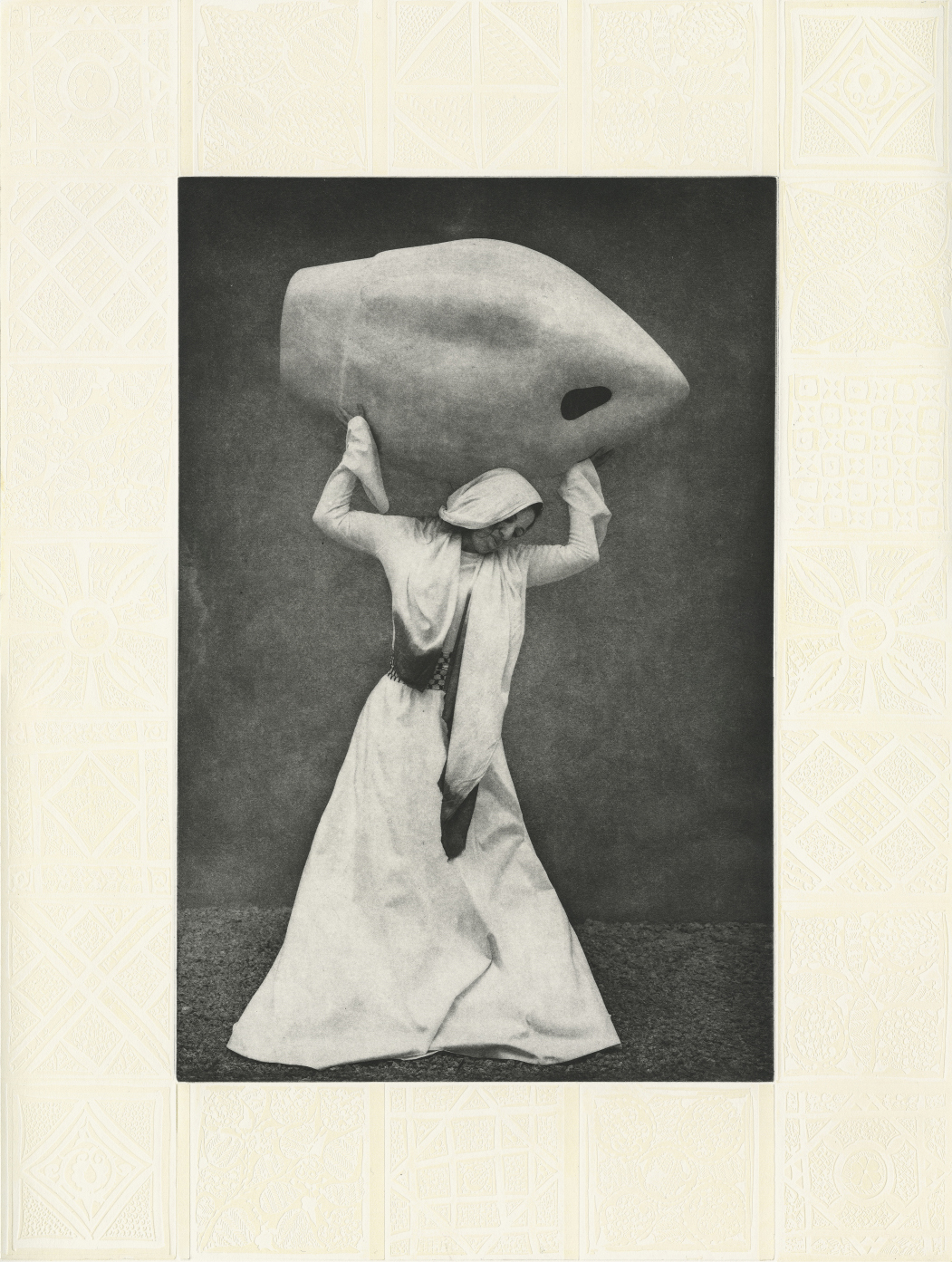 Sama Alshaibi, Water Bearer II, 2019. Photogravure print and blind embossing with transparent ink relief rolled on Stonehenge white 100% rag paper. Courtesy of the artist.