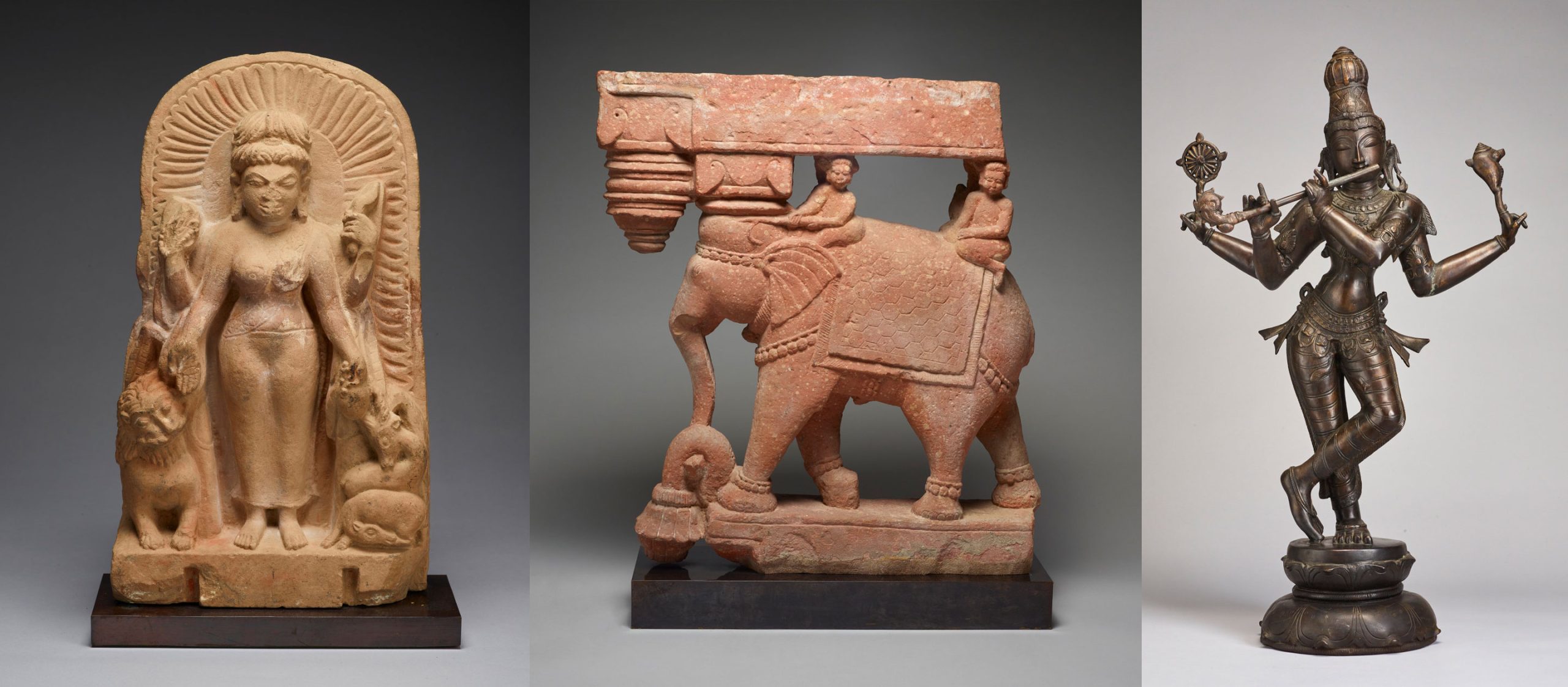 Unidentified artists who worked in North India, Durga/Parvati with Lion, Doe, and Buck, 10th century, revival style of the Gupta period (319–467 CE). Sandstone. Collection of the Birmingham Museum of Art; Gift from the Asian Art Collection of Dr. and Mrs. William T. Price, 2001.68. Photography credit: Erin Croxton; Unidentified artists who worked in India or Pakistan, Elephant with Riders Roof Bracket, 18th century, Mughal period (1526–1857). Red sandstone. Collection of Birmingham Museum of Art; Gift from the Asian Art Collection of Dr. and Mrs. William T. Price in memory of Dr. M. Bruce Sullivan, 2003.55. Photography credit: Carmen Gonzalez Fraile; Unidentified artists who worked in Tamil Nadu, South India, Vishnu in the Form of Venugopala, the Flute-Player, 19th century revival style of the 12th–16th century. Cast bronze. Collection of the Art Fund, Inc. at the Birmingham Museum of Art; Gift of Emily Bourne Grigsby, AFI.30.2010a-b. Photography credit: Erin Croxton.