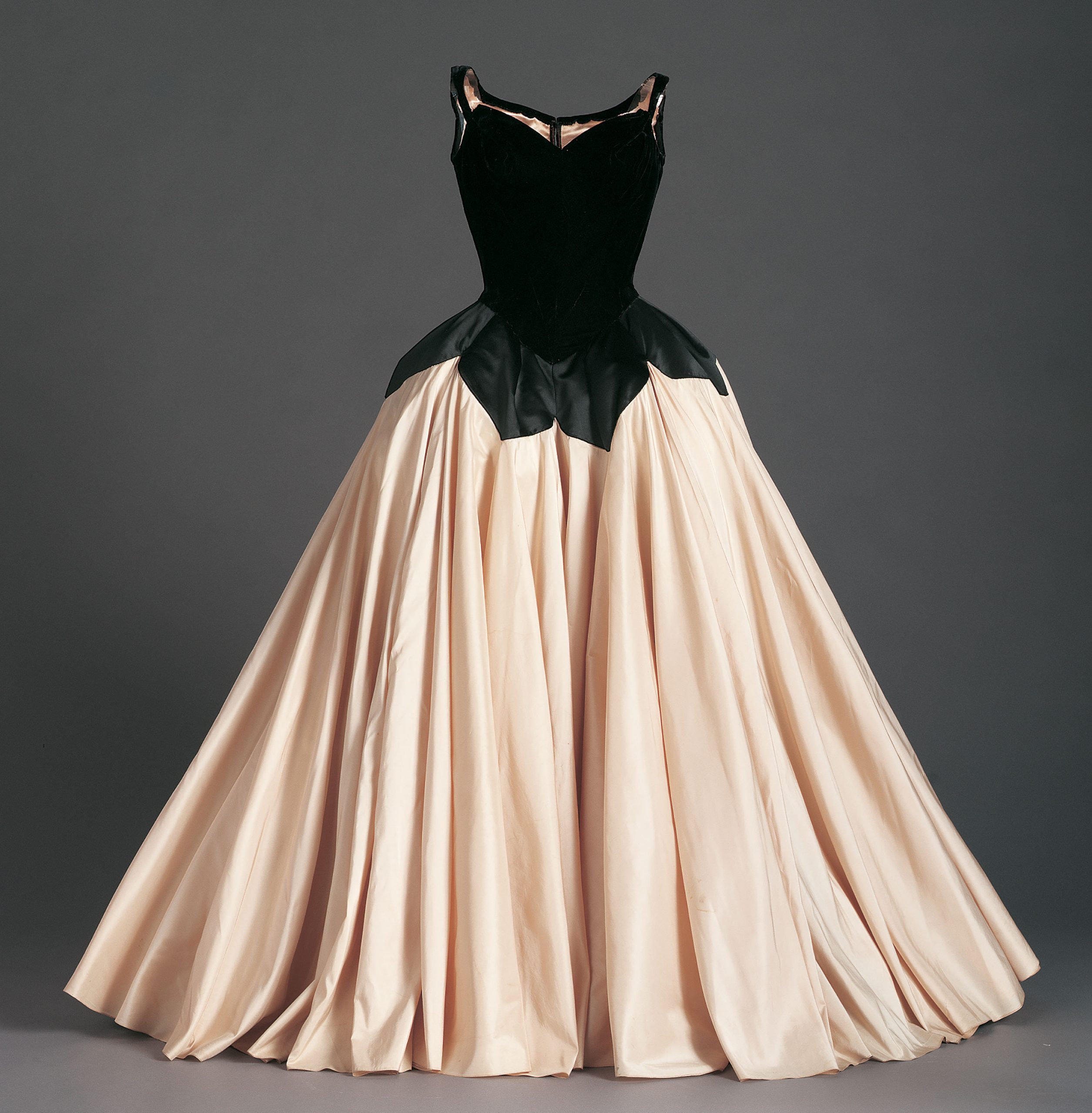 Charles James, Black velvet and ivory satin ballgown with full skirt, 1951. Silk velvet, silk faille and silk satin. Collection of Phoenix Art Museum, Gift of Mrs. Eleanor S. W. McCollum.